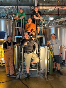 The Old Stump Brewing Team on the Kettle Stand