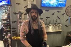 Old Stump Halloween Party 2023 - Man in costume behind bar